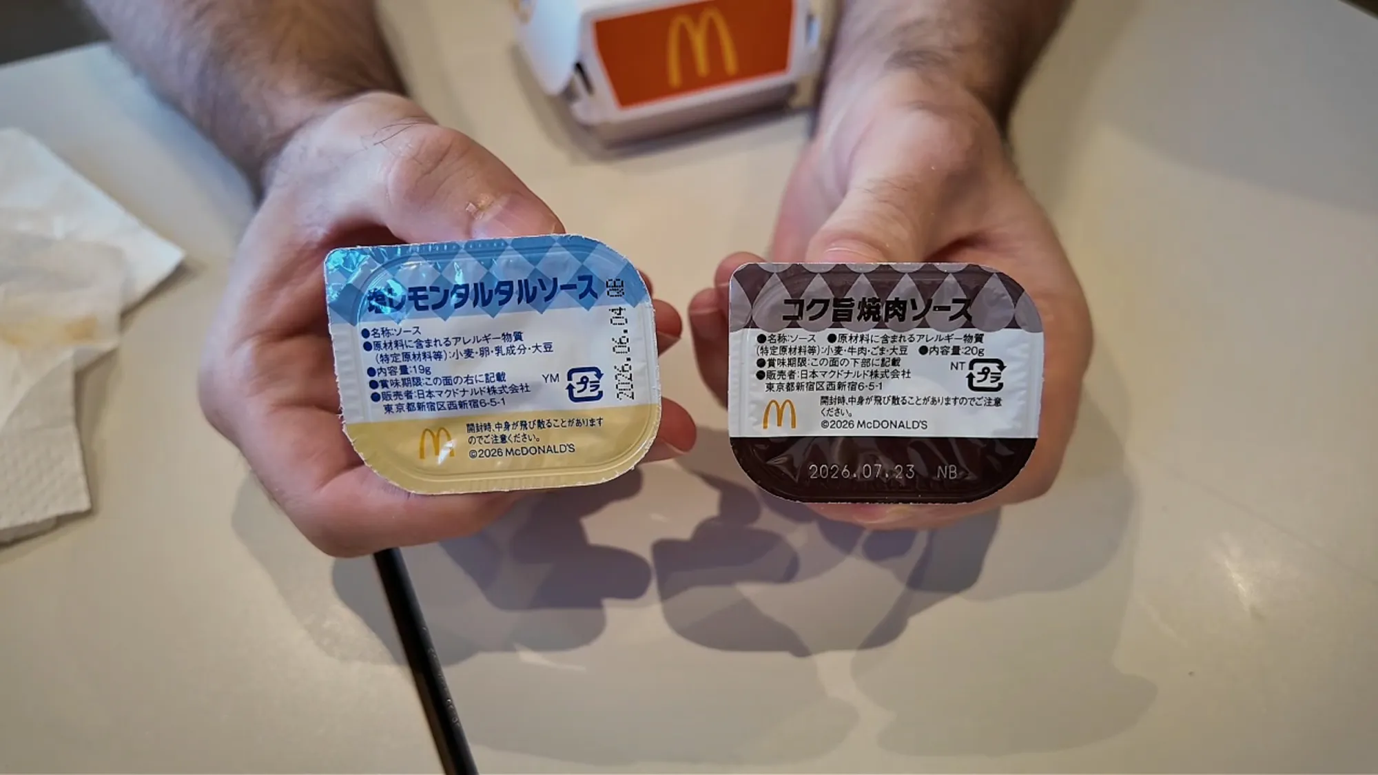 The two limited-time McDonald's Japan nugget sauces held side by side: Salty Lemon Tartar and Yakiniku.