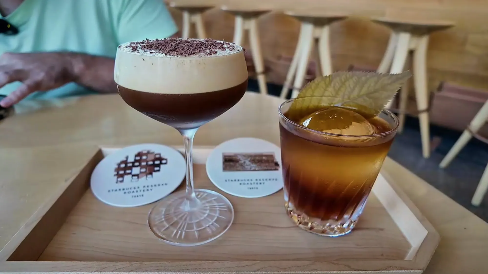 Two coffee cocktails on a wooden tray at the Starbucks Reserve Roastery Tokyo.