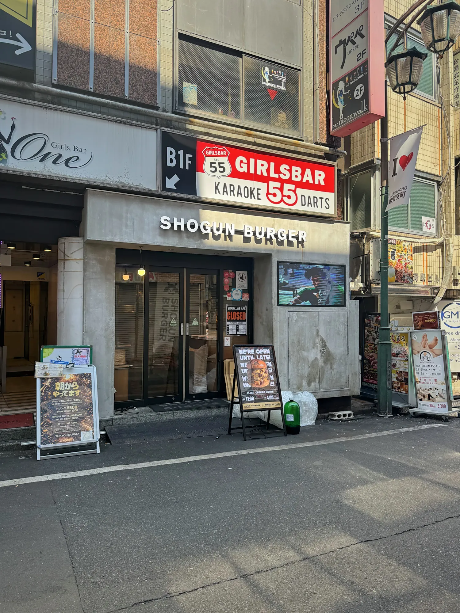 The front of a Shogun Burger restaurant on a Kabukicho street in Shinjuku, Tokyo.
