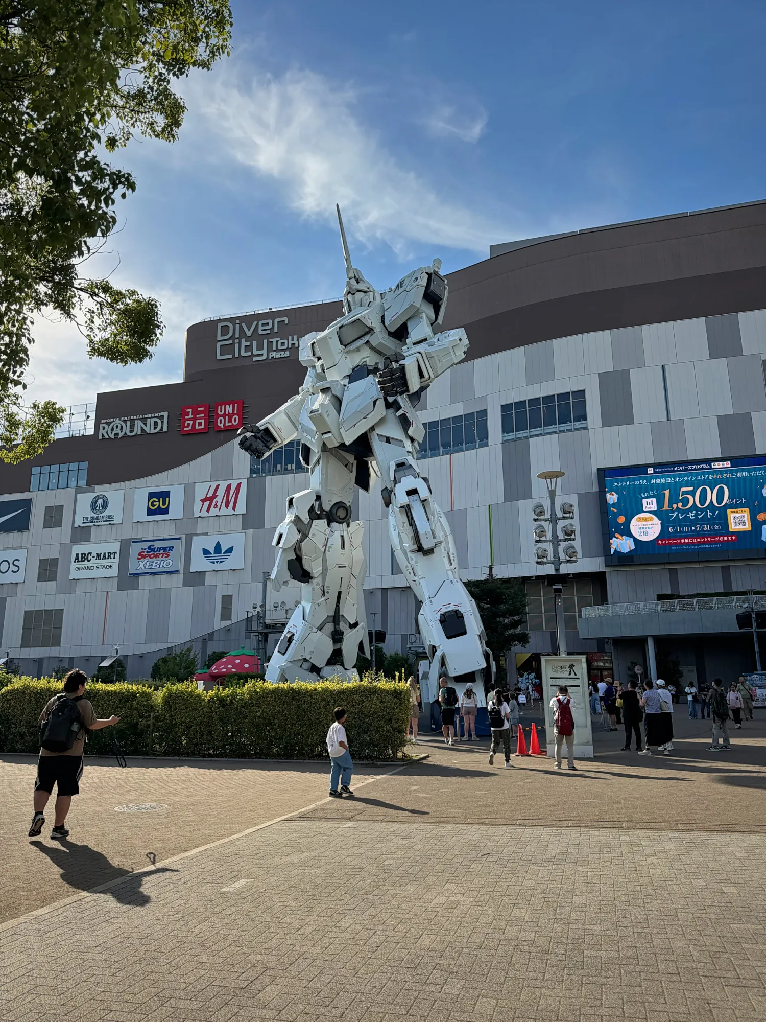 The life-size Unicorn Gundam statue outside DiverCity Tokyo Plaza in Odaiba, Tokyo, in May 2026, before it was removed.