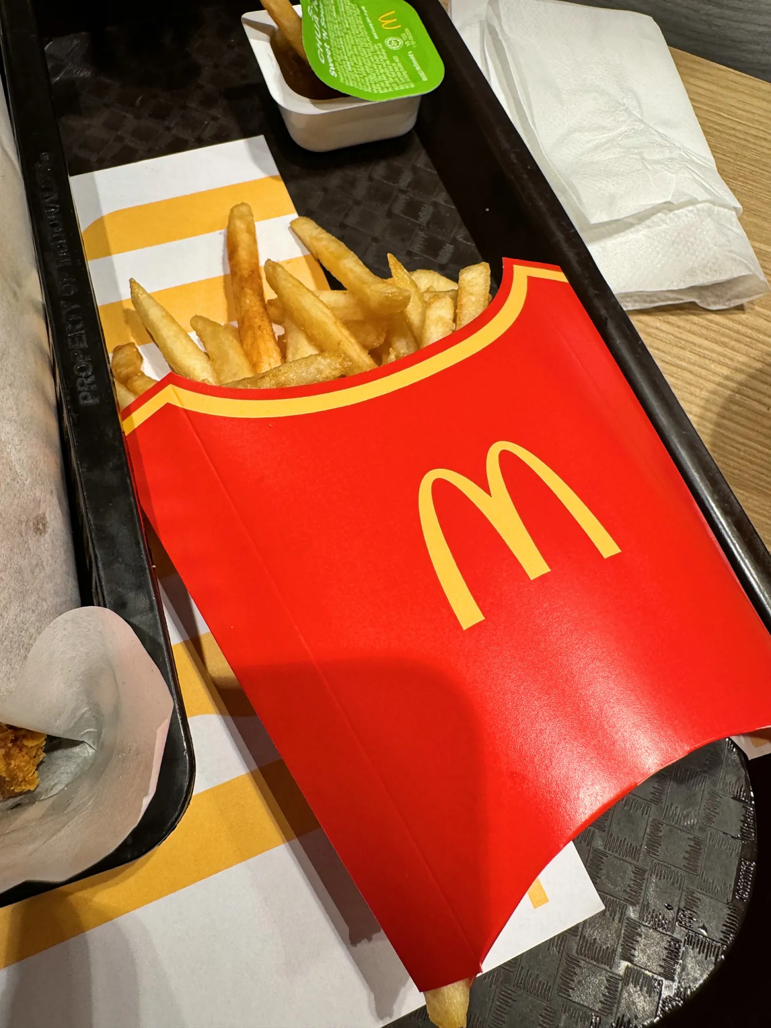 A red carton of McDonald's fries on a tray in Da Nang, Vietnam.